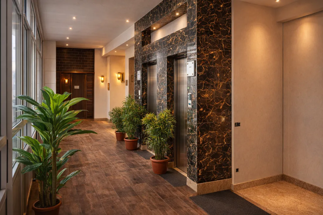 Lift lobby with Italian marble cladding and wooden flooring
